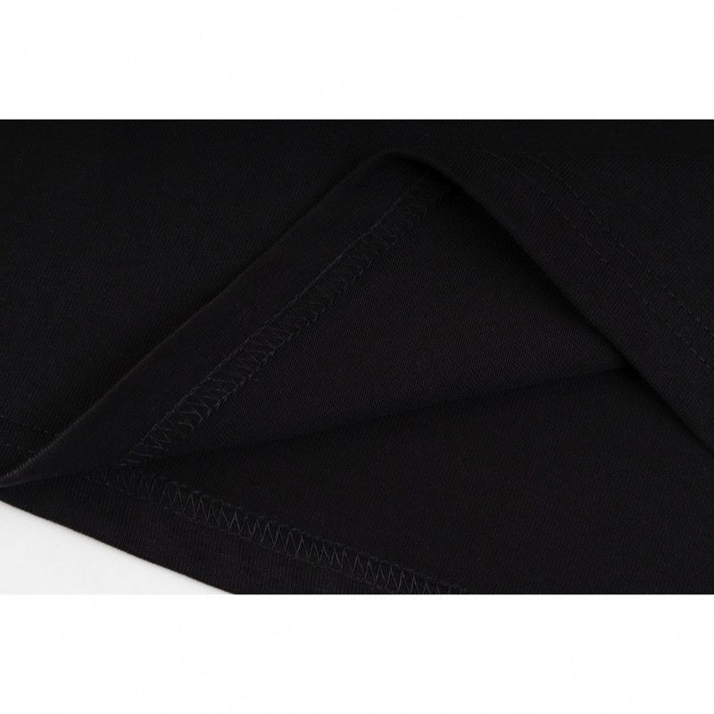 Givenchy Black Cotton T-Shirt with Metal Logo Plaque