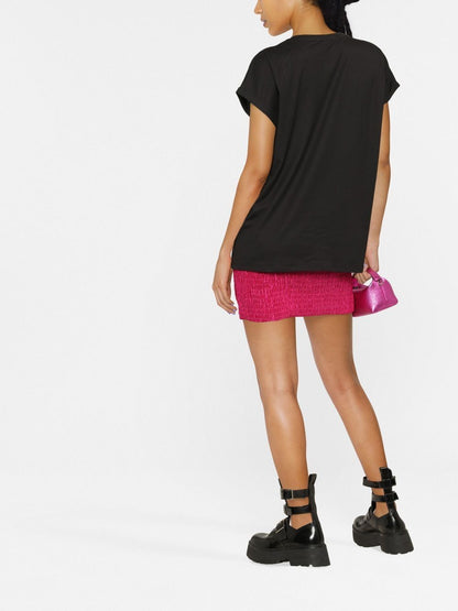 BALMAIN Women Eco-designed cotton T-shirt White flocked logo Black